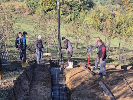 Mannen bij een bouwlocatie
